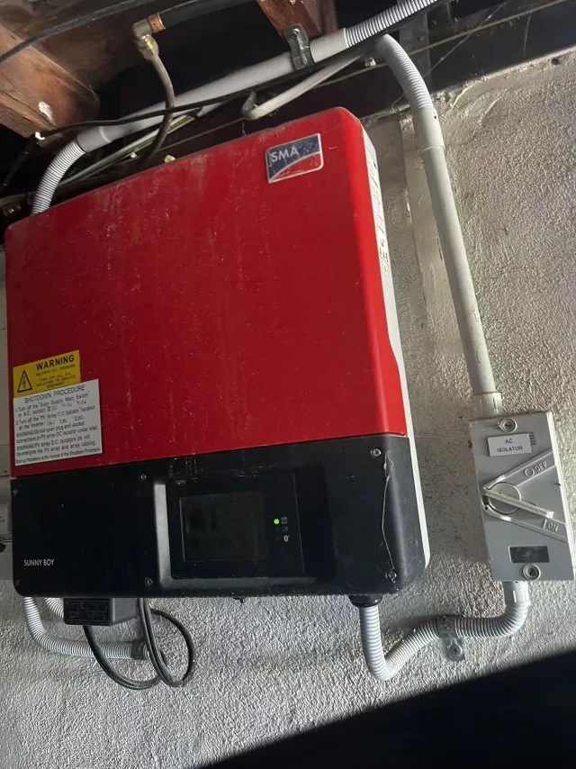 Existing SMA solar inverter at the case-study property before the FoxESS battery retrofit